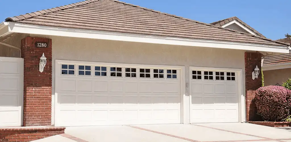 Residential garage door repair service for a double garage door in Cape Coral, FL