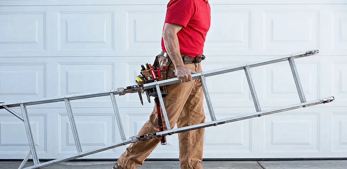 Garage door repair technician arriving with tools and ladder in Cape Coral, FL