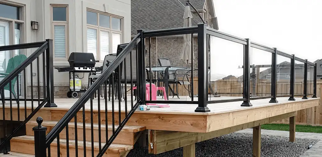 Handrail installation on a deck staircase for safety and code compliance in Cape Coral, FL